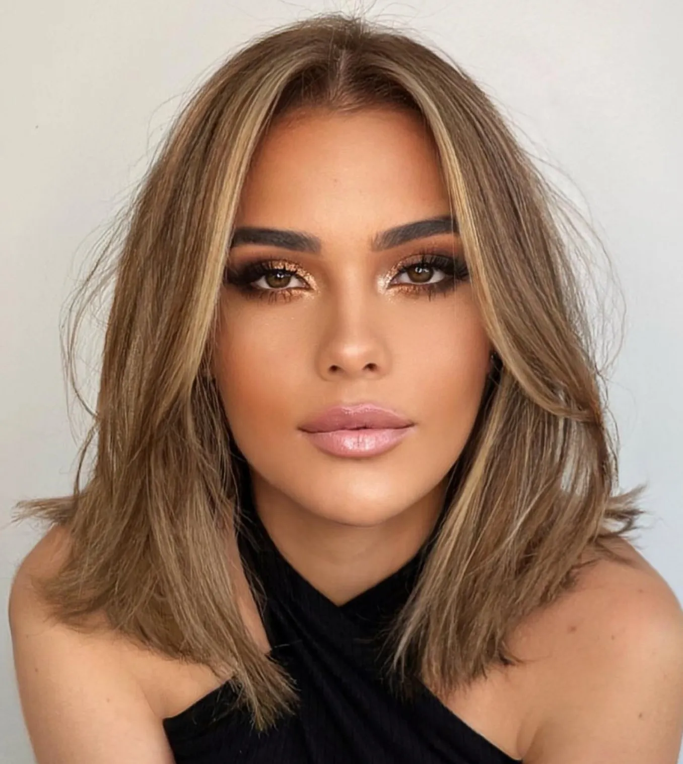 21 Low Maintenance Medium & Shoulder Length Haircuts for 2024